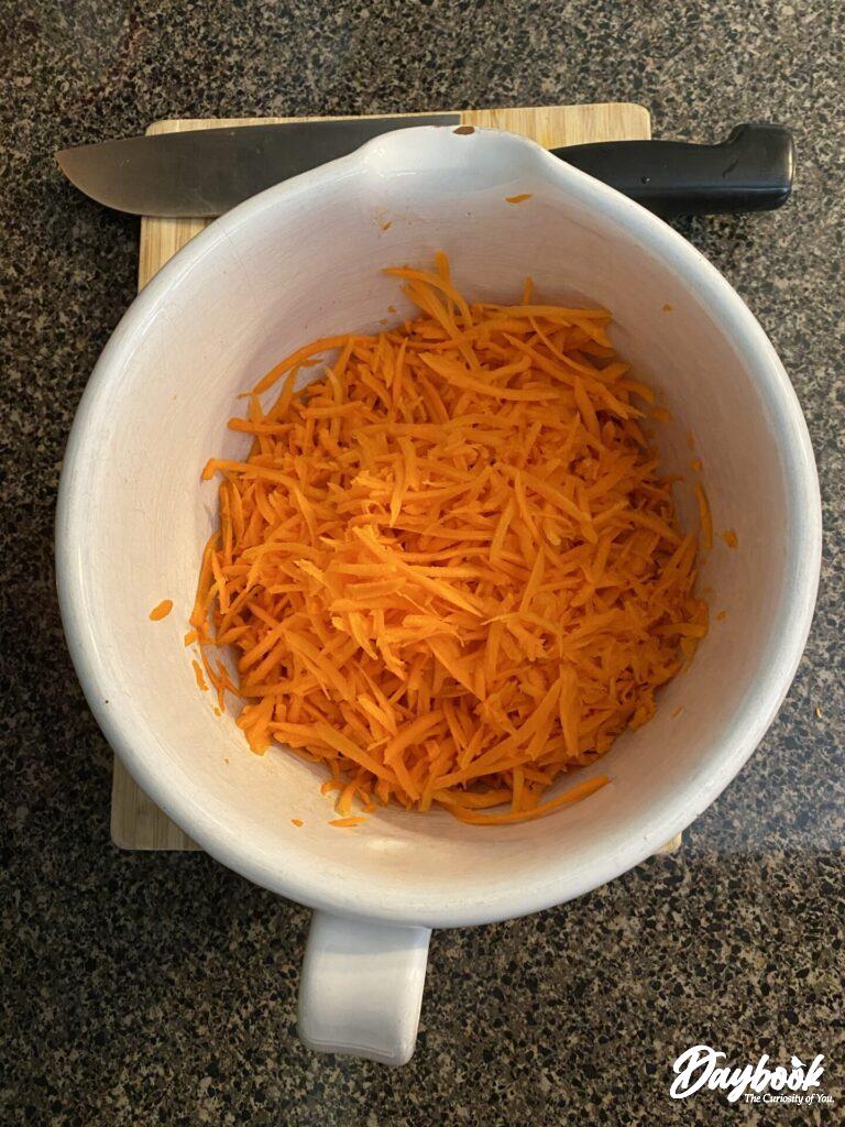 grated carrots in a bowl