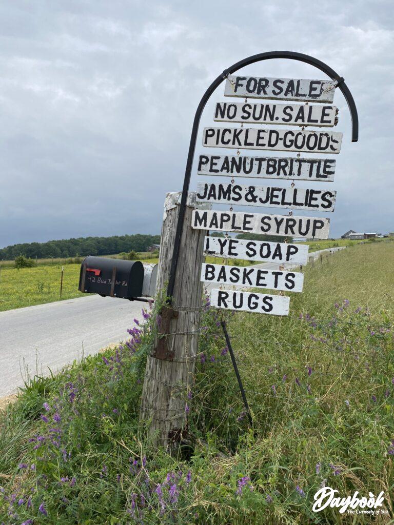 Amish hand-painted sign by mailbox
