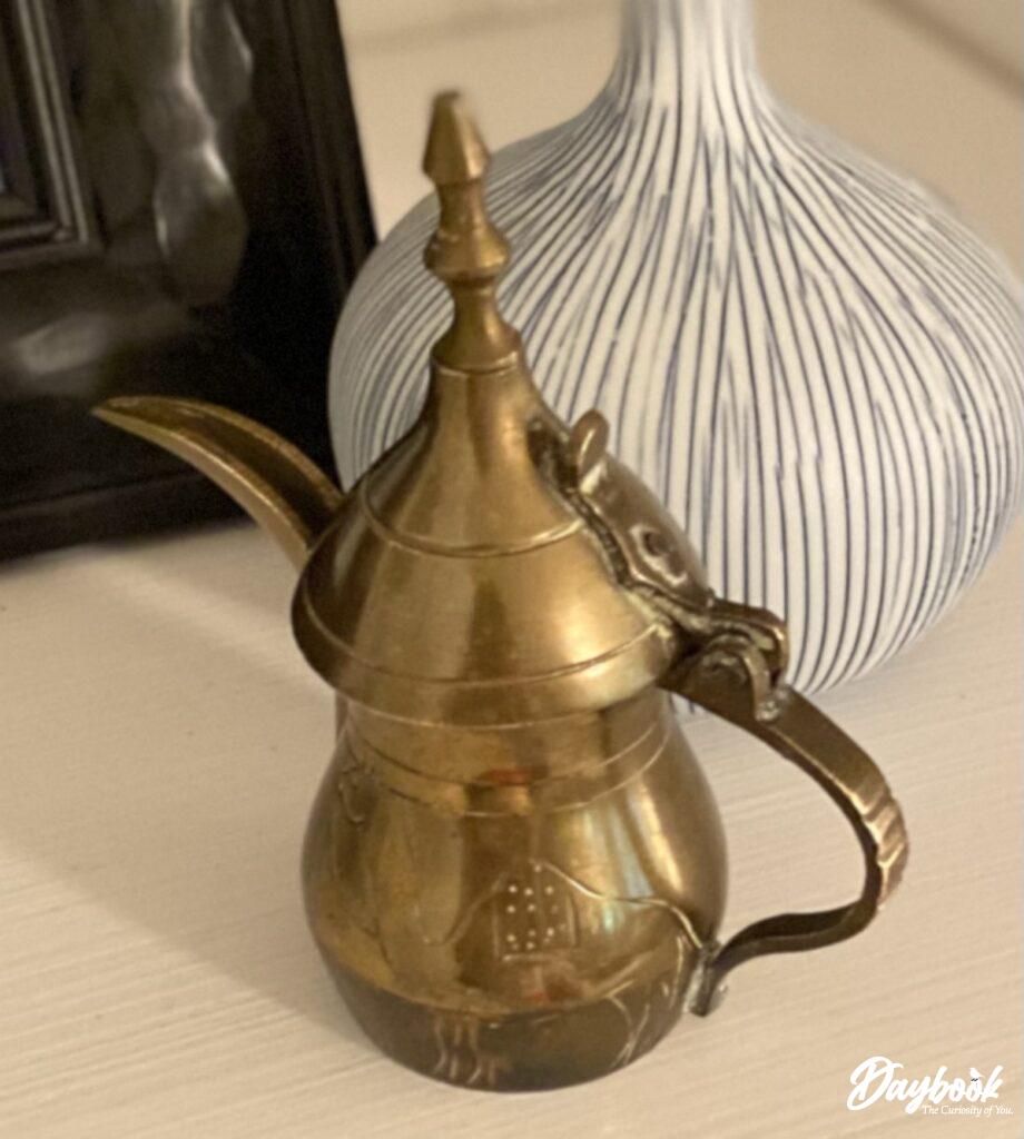 brass pitcher with etching