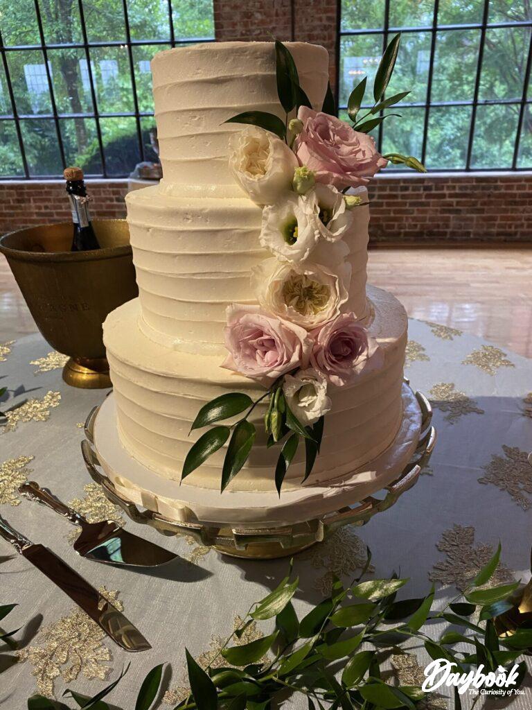 three layer wedding cake with flowers