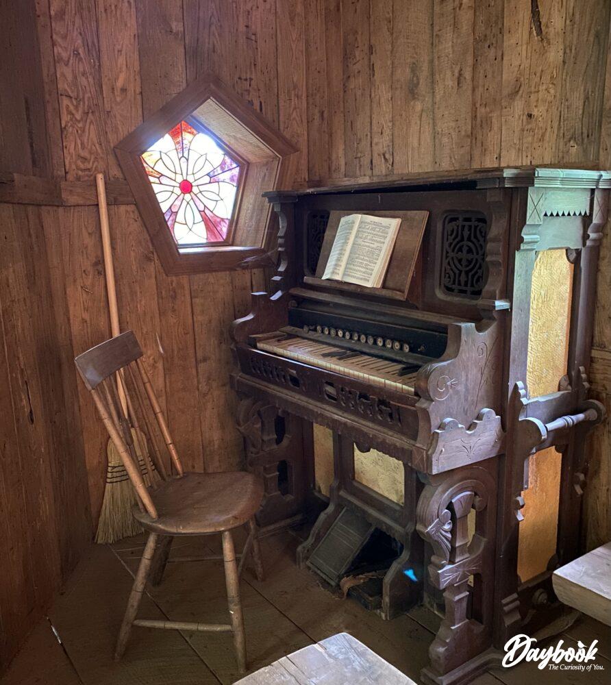 piano inside a primitive church