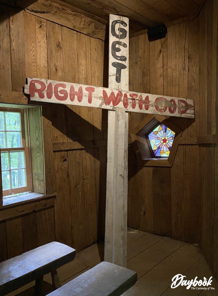 Cross with words painted