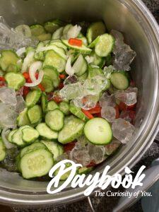 cucumbers, onions, and peppers in ice bath