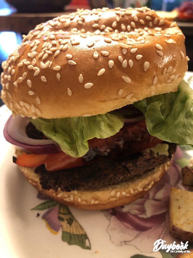 Hamburger with onions and lettuce