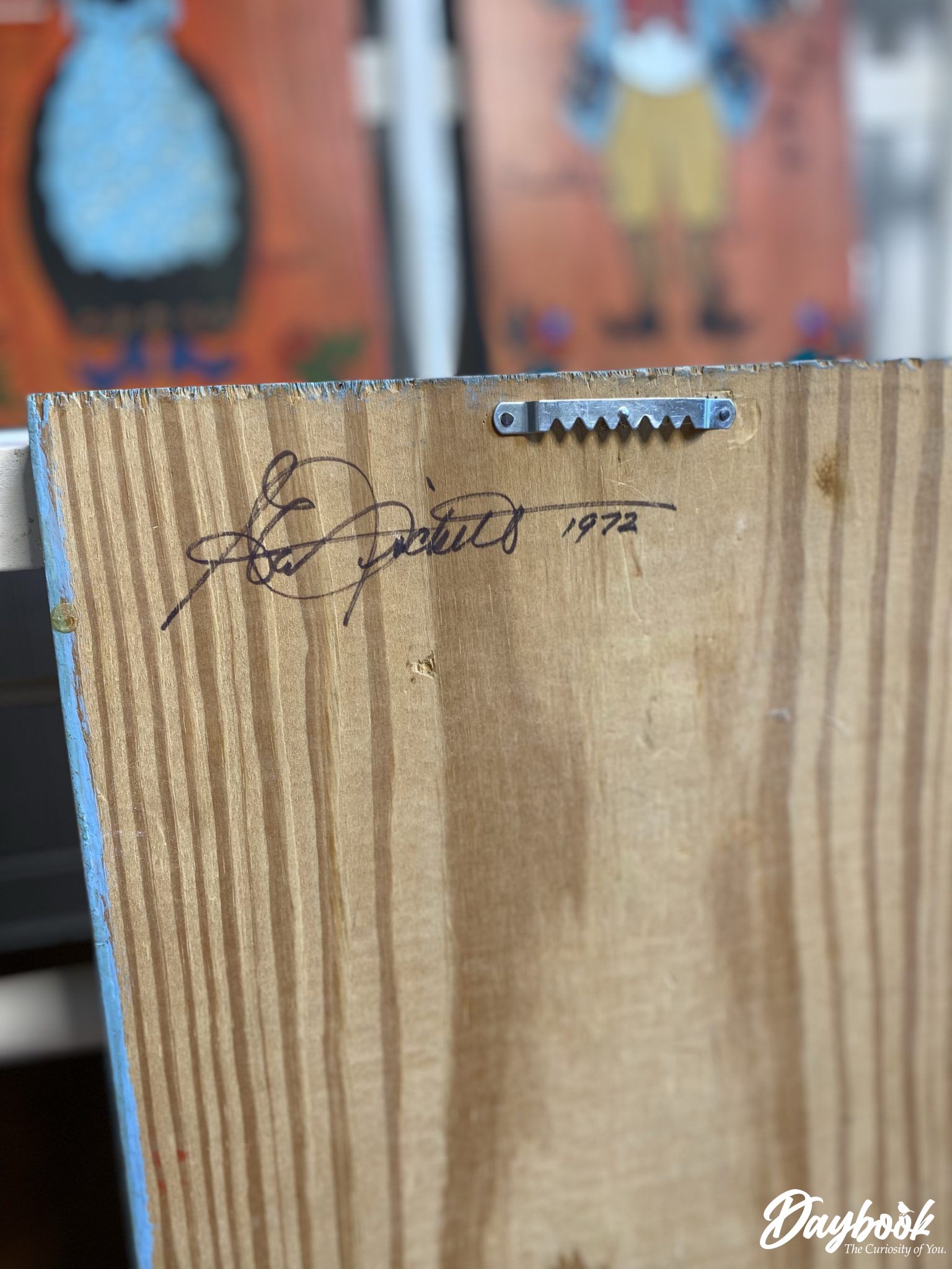 Full artist signature on back of folk art painting