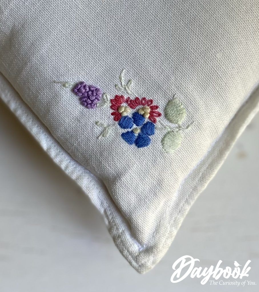 embroidered pillow corner