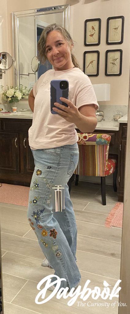 girl in a pair of embroidered jeans