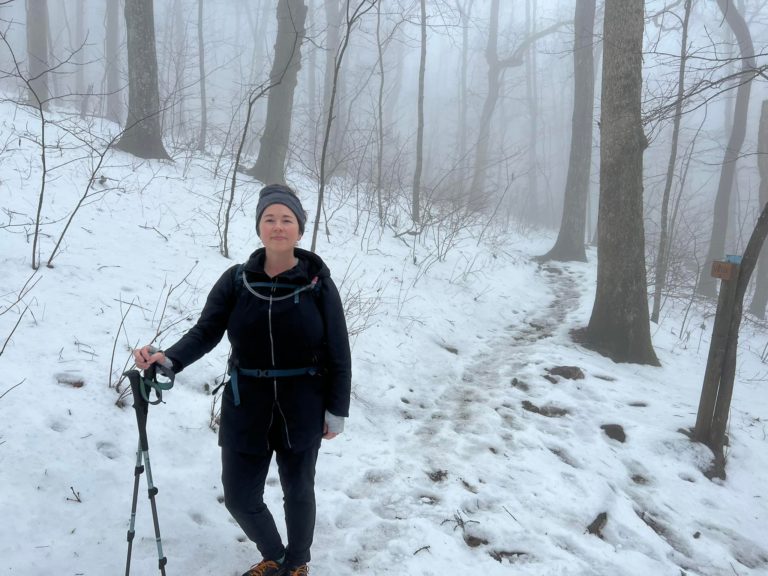 Jill Fogarty hiking a snowy trail at Amicalola Falls