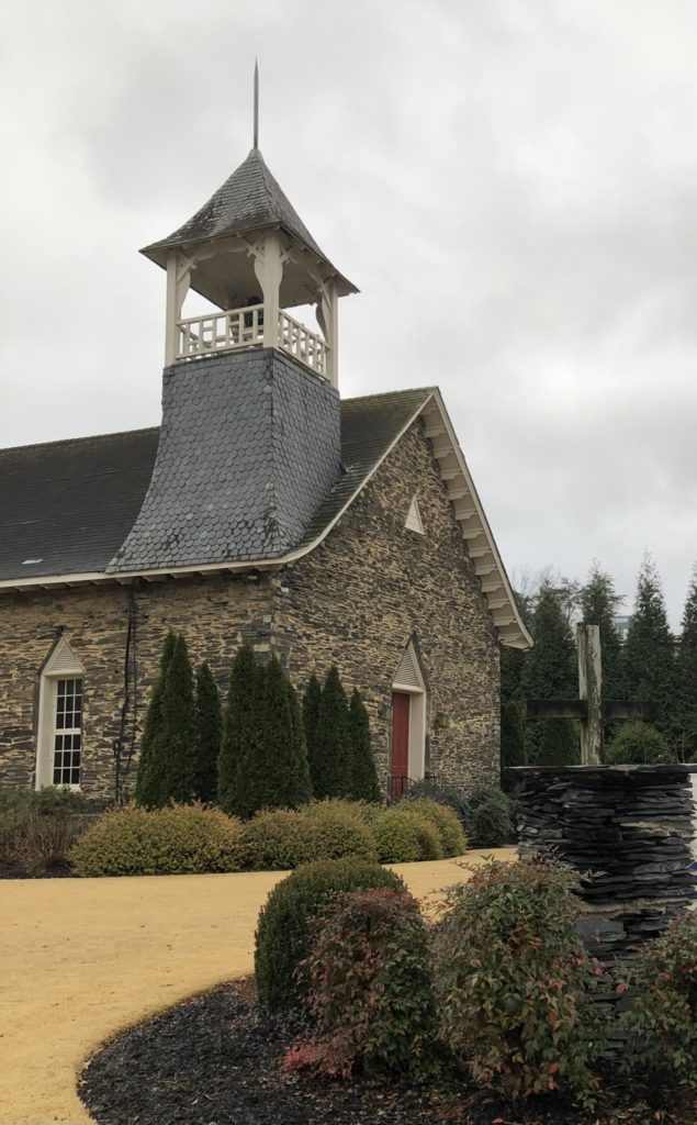 A local historical church made of stone and brick and beautifully landscaped in Rockmart, Georgia.