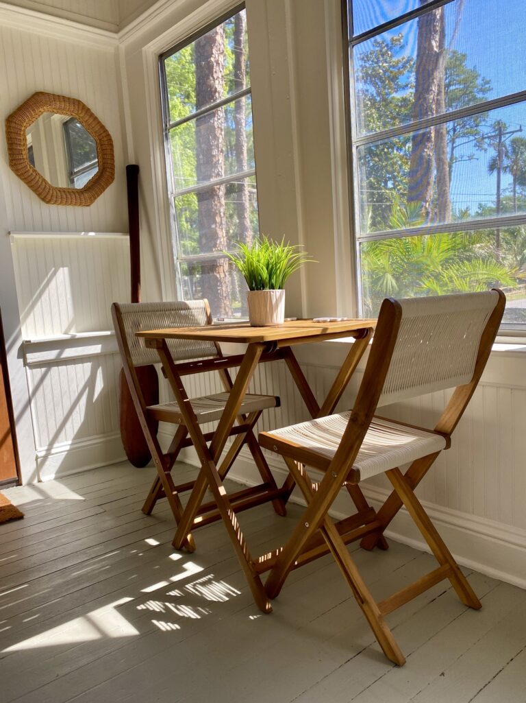 A breakfast table on a sunny front porch in Florida.